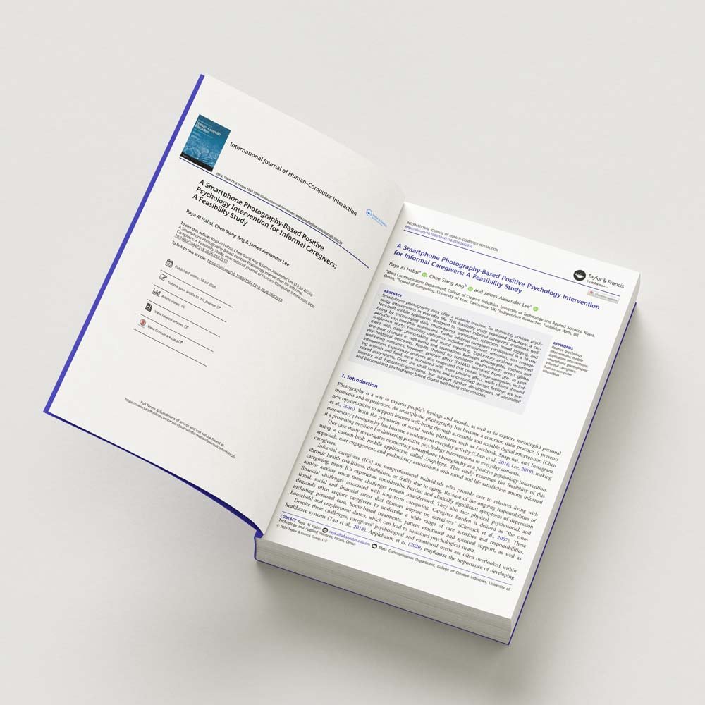 An open book with the first two pages of the paper.
